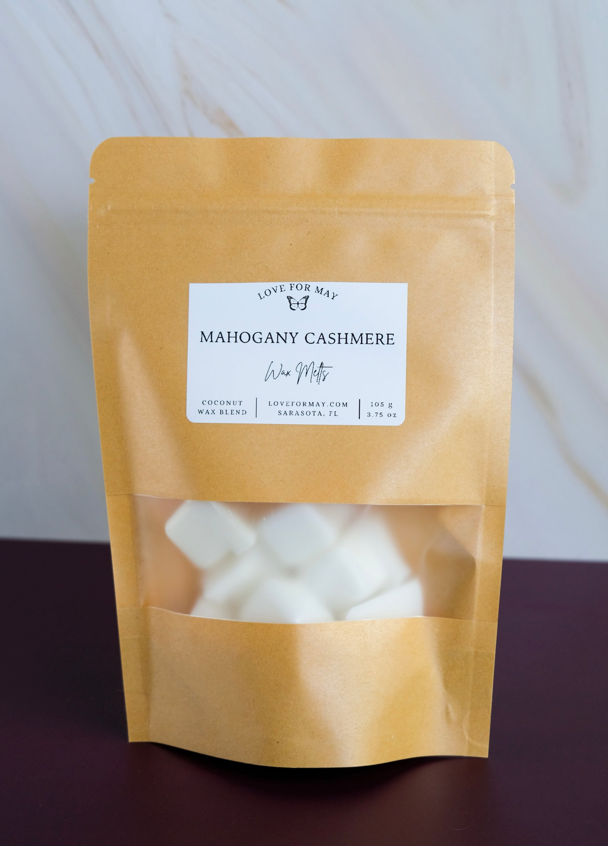 Kraft bag with mahogany cashmere scented wax melt cubes