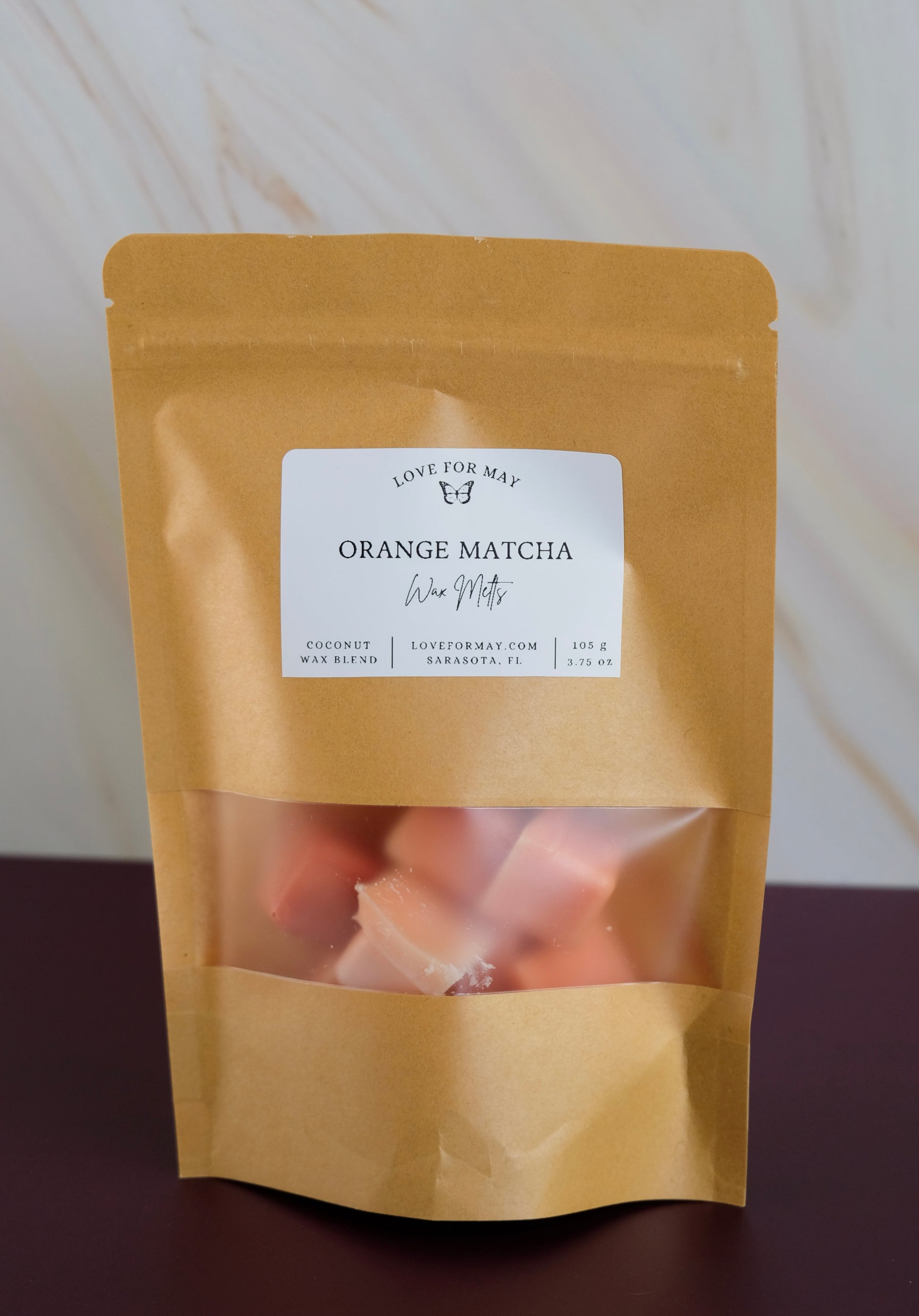Kraft bag with orange matcha scented wax melt cubes