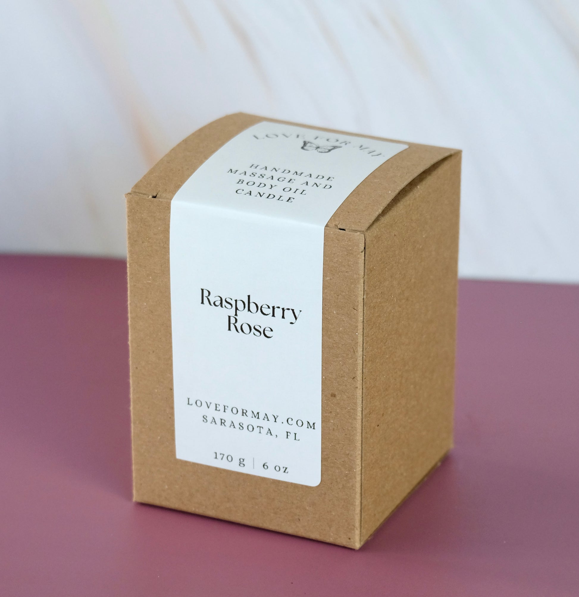Body oil candle massage candle raspberry rose in a kraft box
